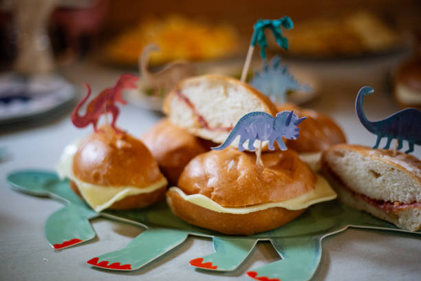 istock Many sandwiches dinosaur decorated on a birthday party 2165832499