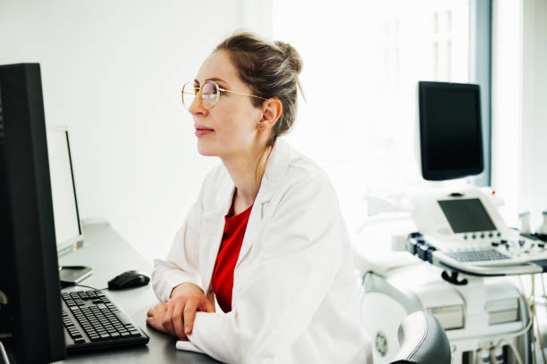 istock Focused Medical Professional at Workstation 2165833424