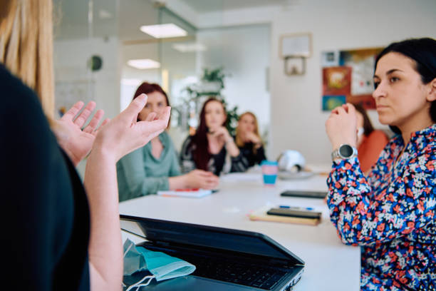 istock Diverse Business Team Discussing Projects in a Modern Glass Office. 2165836026