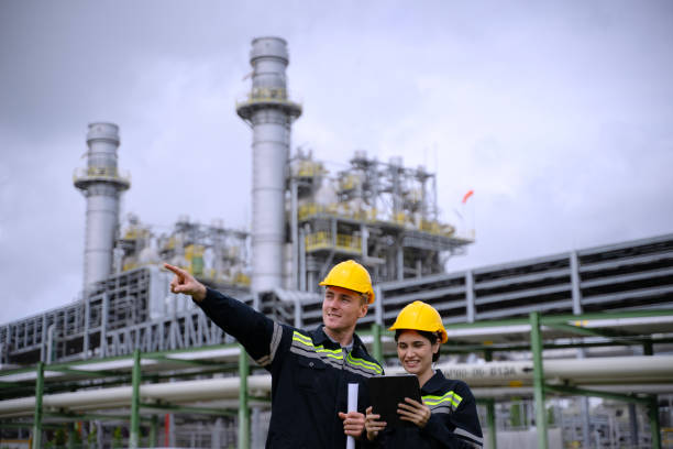 istock Blue collar workers are working at refinery factory. 2165836760