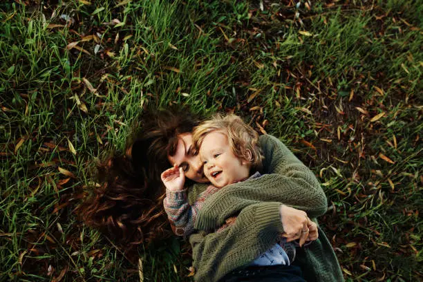 Shot Of A Single Mother Spending Some Time At The Park With Her Son Shot Of A Single Mother Spending Some Time At The Park With Her Son