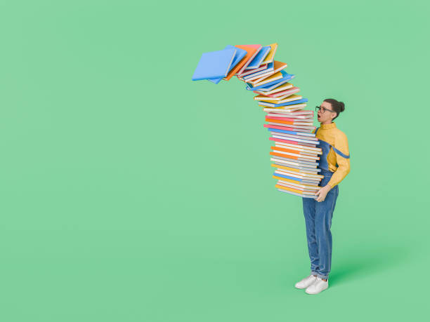 istock Woman Holding a Tall Stack of Falling Books on Green Background 2165838641