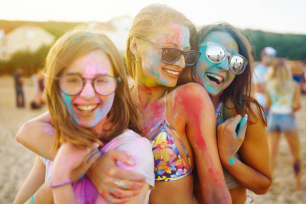 istock Group of friends having fun with powder paint. 2165839708