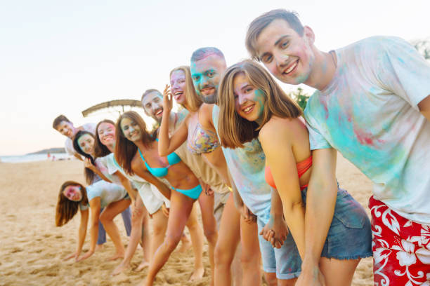 istock Group of friends having fun with powder paint. 2165839885