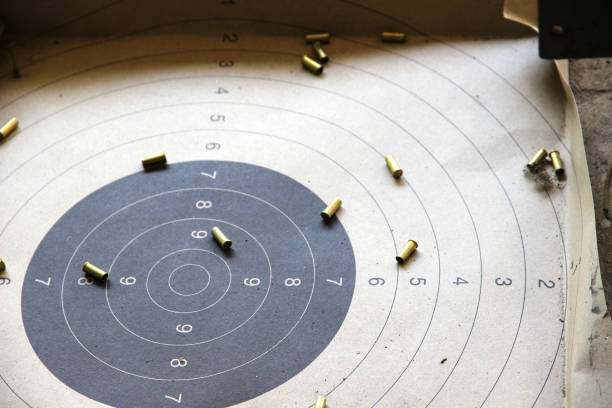 istock Many shell casings in shooting practice. Shooting target background. 2165840197