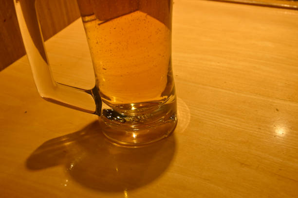 istock A glass of beer on a table 2165841683