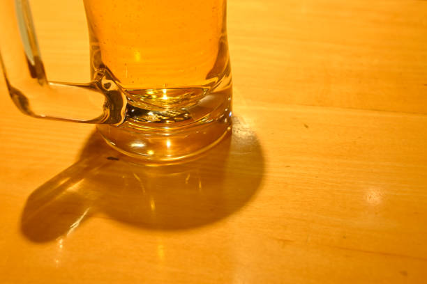 istock A glass of beer on a table 2165841686