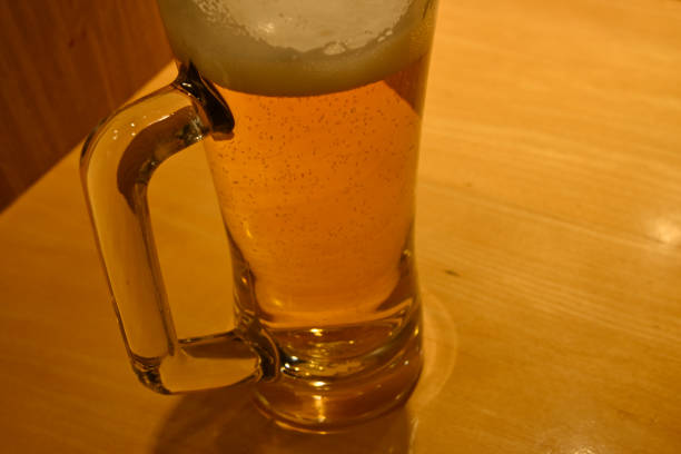 istock A glass of beer on a table 2165841687