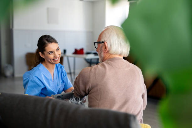 istock Compassionate Nurse Conducts Home Health Check 2165842898