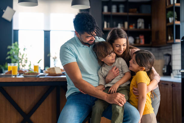 istock Joyful Multiethnic Family in Home Kitchen 2165843148