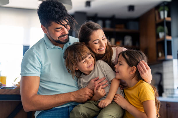 istock Joyful Diverse Family in Modern Kitchen Portrait 2165843158