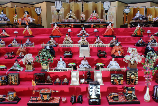 Hinamatsuri is doll’s day or girls’ day, an annual festival in Japan. Ornamental dolls dressed in elegant attire are arranged on red platforms.