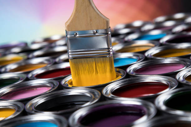 istock Paintbrush on cans with color 2165846615