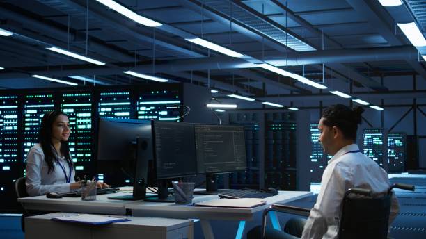 istock Wheelchair user protecting data center hardware equipment 2165849251