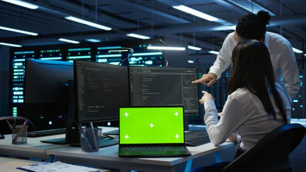 istock Woman updating server room supercomputers systems 2165850568