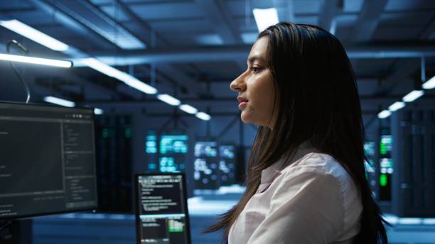 istock Close up of IT expert in server hub establishing performance benchmarks 2165851735