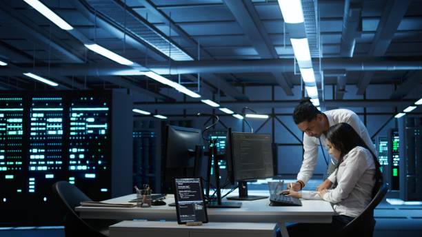 istock Team of specialists updating server room systems 2165853061