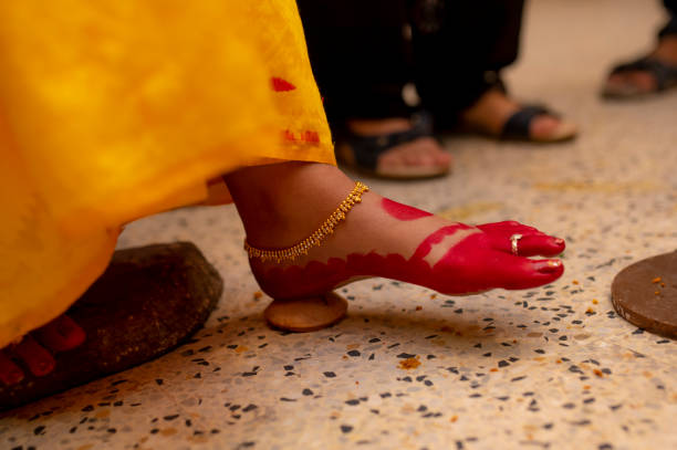 Female feet Bengali wedding ritual