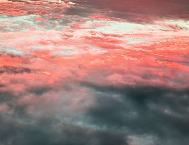 Dark Moody Thunder Clouds Sunset Clouds in a Blue Sky as A Skyscape Background