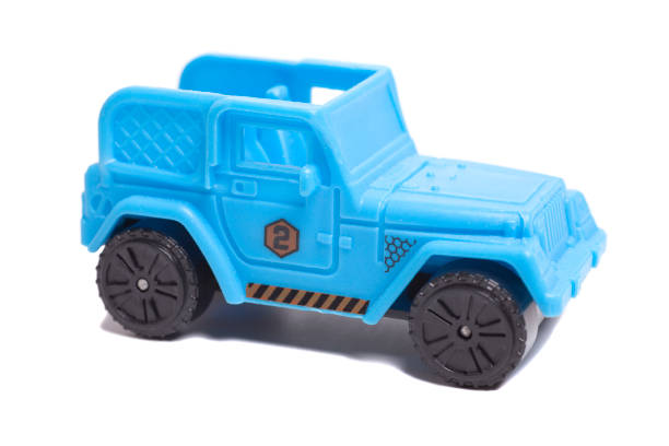 istock toy car isolated on white background. 2165859101