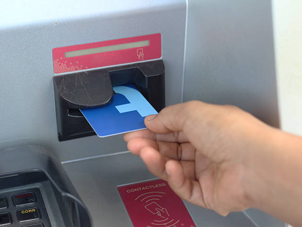 istock Withdraw money from ATM 2165860259