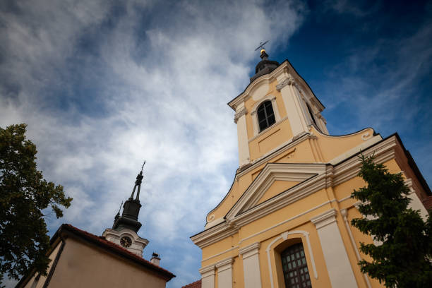 istock Selective blur on a small Serbian orthodox church with a austro hungarian architecture in the region of Banat, in Vojvodina, with a sunny sky. Serbia is orthodox in Majority. 2165860559