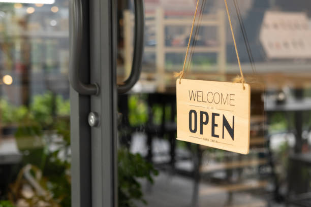 istock A sign hanging from a window that says 
