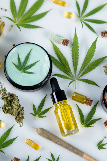 istock Cannabis leaves with marijuana, cbd, Flat lay composition 2165870772