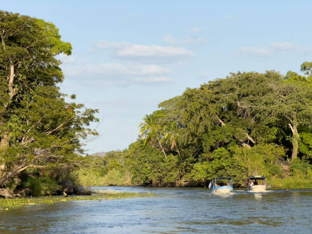 istock Channel with two boats 2165874996