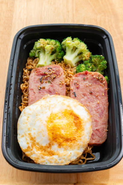 istock angle view take-out fast food of egg with noodles at vertical composition 2165875117