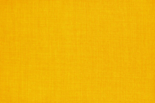 istock Yellow golden linen fabric cloth texture for background, natural textile pattern. 2165878110