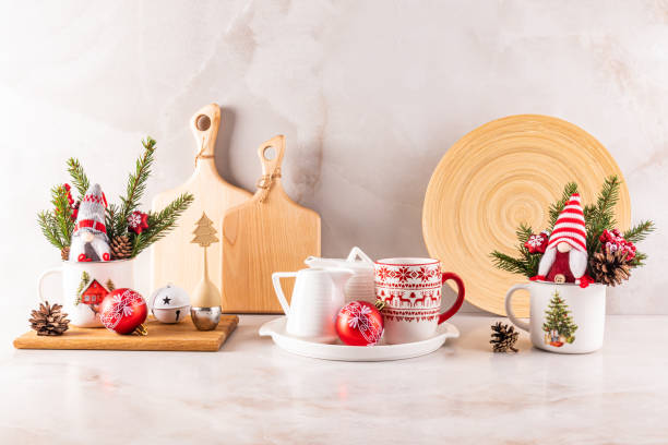 istock New Year's Christmas Kitchen Countertop Background with Eco-friendly Kitchen Utensils and New Year's Eve Ornament Tableware. Front view. 2165878497