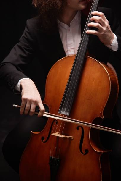 istock Instrumentalist Performing Suite for Violoncello in Recording Studio 2165879001