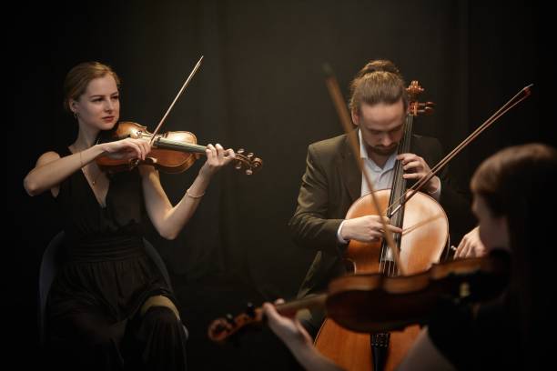 istock Chamber Ensemble In Elegant Clothes Performing in Studio 2165879064