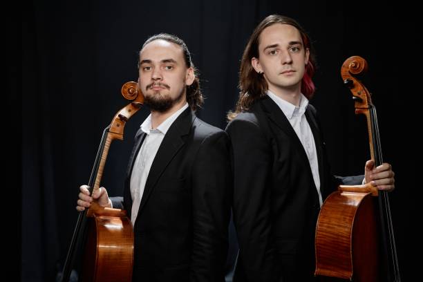 istock Classical Music Artists with Cello and Contrabass Looking at Camera 2165879073
