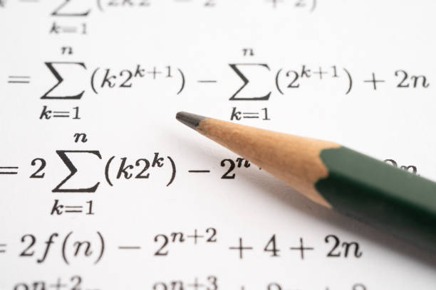 istock Pencil on mathematic formula exercise test paper in education school. 2165879158