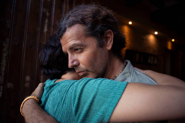 Wife comforting her partner