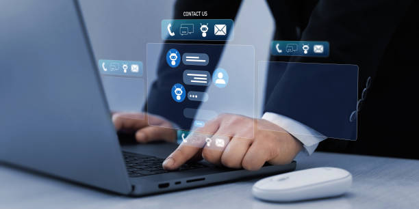 istock Customer service, helpdesk advice online chat support. Contact us for online support. Business person watching on virtual screen. 2165882272