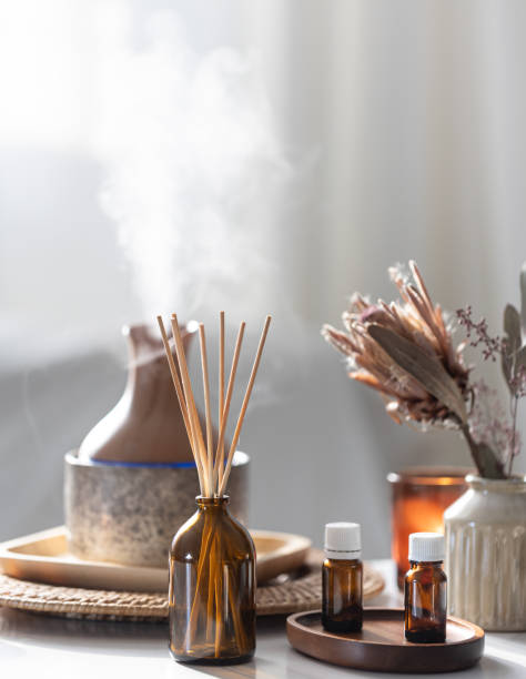 istock Spa composition with incense sticks, air humidifier and aroma oils. 2165884593
