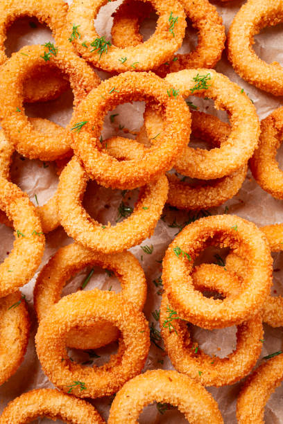 istock Deep fried onion rings, appetizer, close-up, top view, full frame, no people, favorite dish, 2165886846