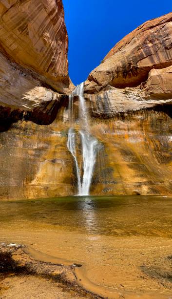 istock Lower calf creek falls with pool and blue sky 2165889887