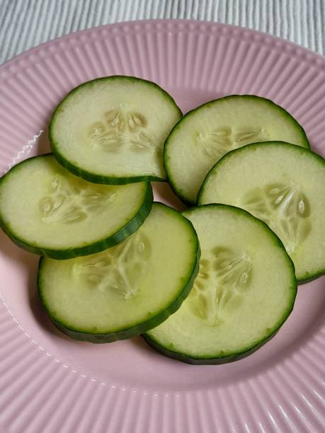 istock Sliced cucumber on plate 2165892750