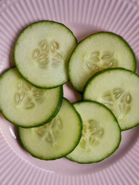 istock Slices of cucumber on plate 2165892755