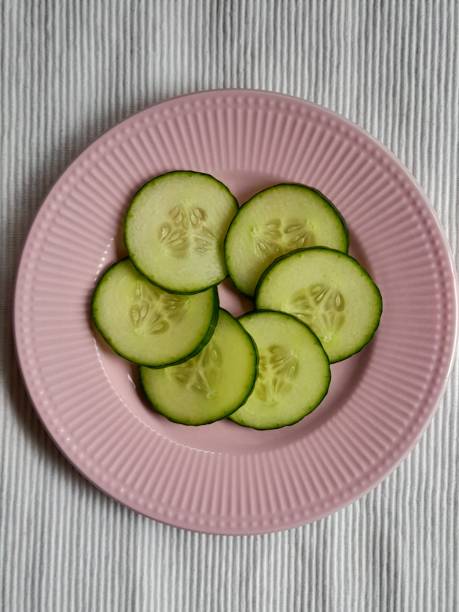 Slices of cucumber on plate