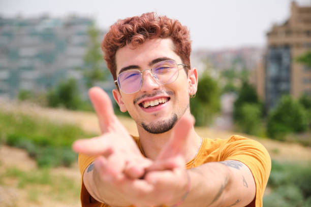 istock Young man reaching out for a hug with open arms 2165893704