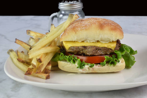 istock cheese burger with tomato and lettuce 2165894637