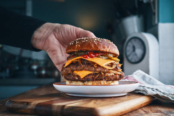 istock Double BBQ Burger with French Fries 2165900046