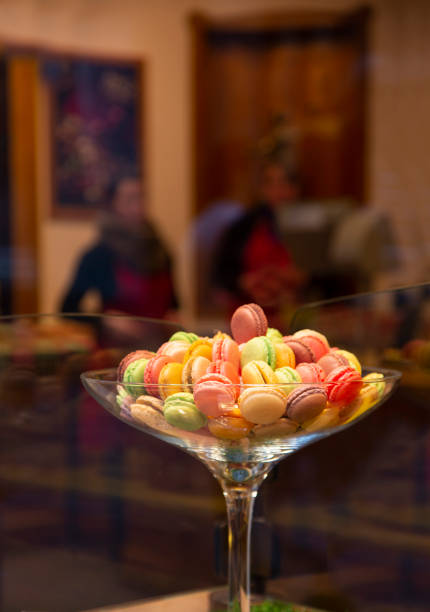 Belgium, Brussels, Grand place de Bruxlles,  window display of macaroons in shop window