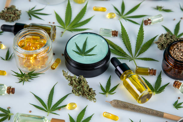 istock Composition, hemp oil, cannabis leaves, marijuana, Flat lay on white background 2165900373
