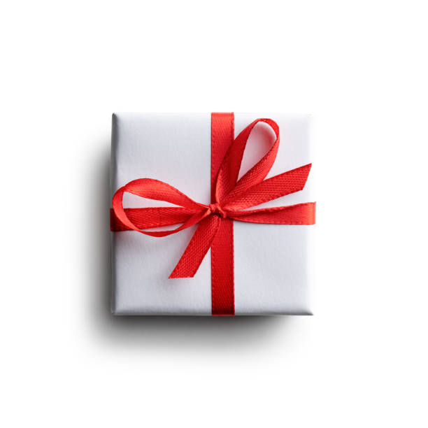 istock White gift box with red ribbon bow isolated 2165901055